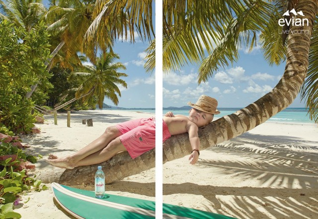 3.依云礦泉水一半身體年輕平面廣告創意設計-上海廣告設計公司廣告欣賞-棕櫚樹篇