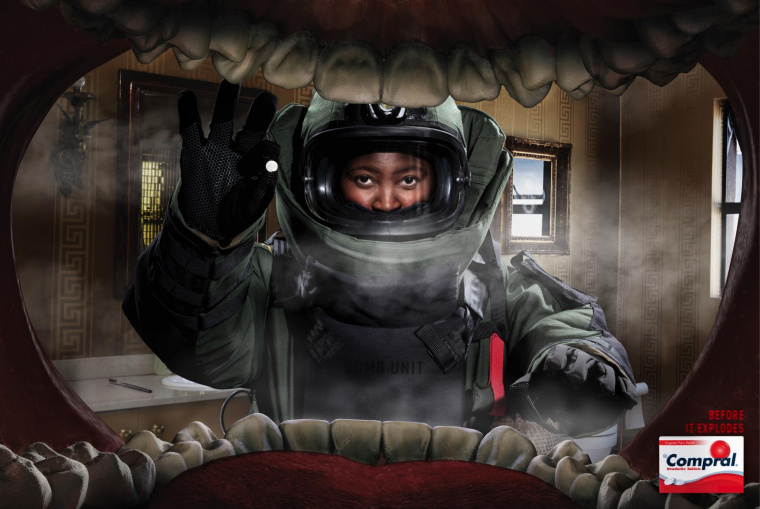 Compral 頭疼藥平面廣告創意設計“大嘴吃藥篇爆炸性頭痛”-上海藥品平面廣告策劃設計公司