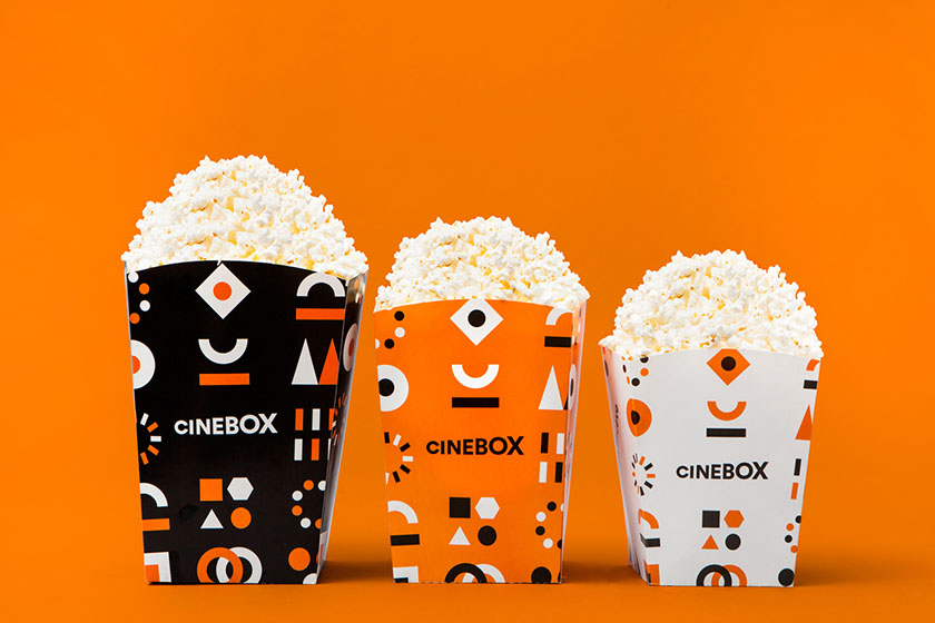 充滿活力激情與超現實主義的CINEBOX電影院品牌vi設計空間設計