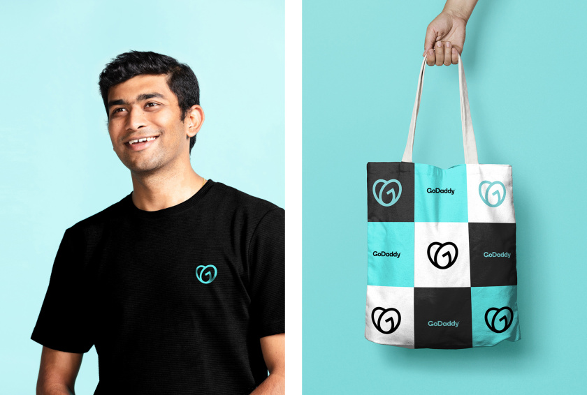 GoDaddy 域名注冊商和網站空間托管公司心形logo設計vi設計