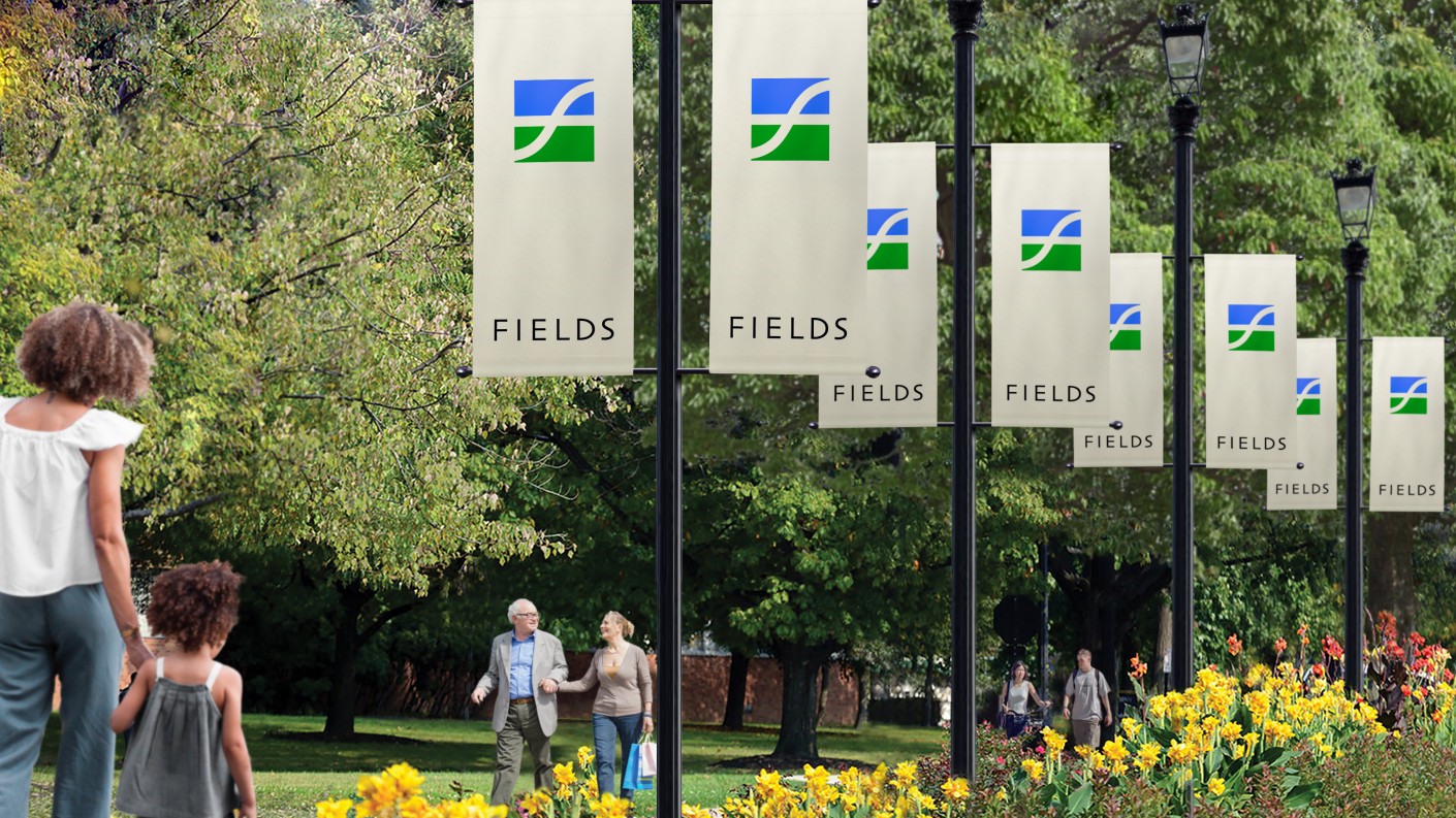 Fields菲爾茲莊園社區住宅地產logo設計，彎曲“F”表示河流和干道的交叉