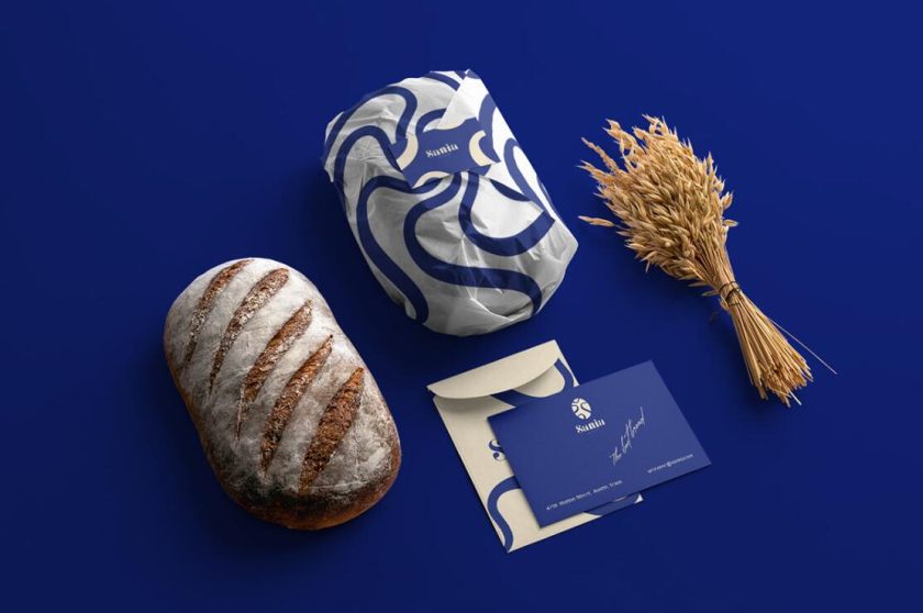 sania 烘培面包店品牌vi形象設計，寶藍色面包手繪線條輪廓圖案