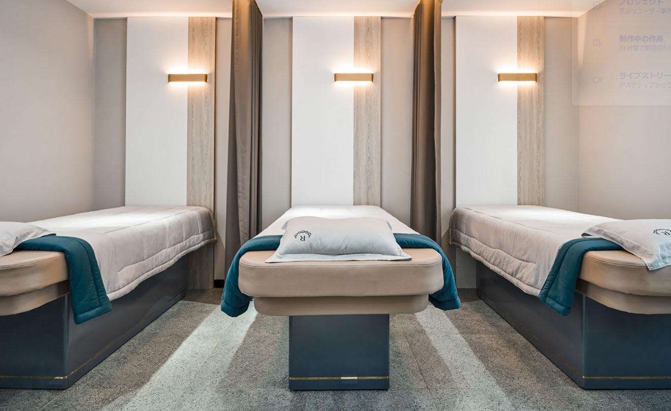 Ruco非手術美容與皮膚護理醫療logo設計vi設計。青黑色金色奢侈風與循環交叉線條-醫療中心內部空間設計